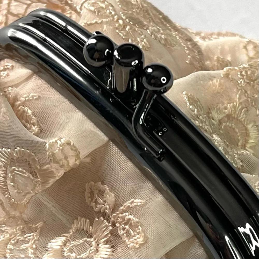 Beige Lace Clutch Wallet with Black Frame Closure